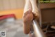 A close up of a woman's feet on a barre.